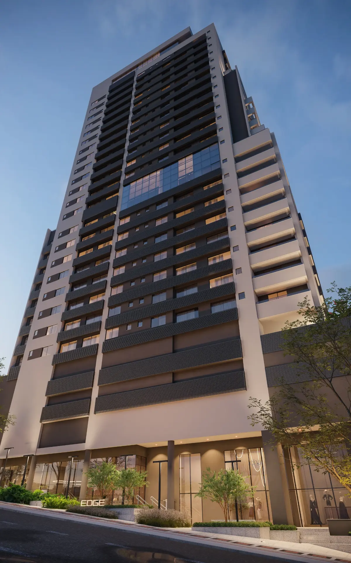 Fachada do EDGE Contorno vista da rua, com lojas no térreo, em Belo Horizonte